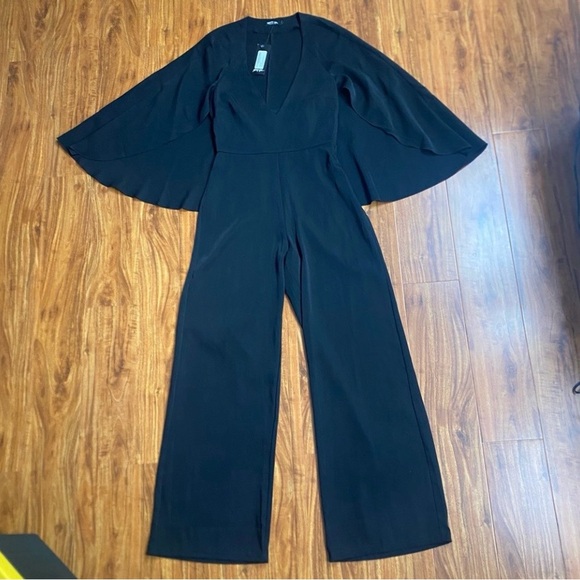 NWT New Nasty Gal Women's Black Deep V Neck Cape Straight Leg Jumpsuit Size 4 - Picture 2 of 16